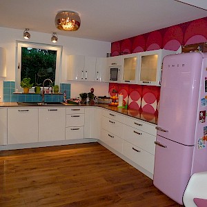 Abgerundete Nolte Küche mit aufgdoppelter Quarzkompositplatte in Münster